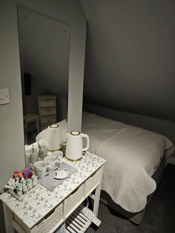 Room and tea and coffee set up at Black bull with rooms Cumbernauld