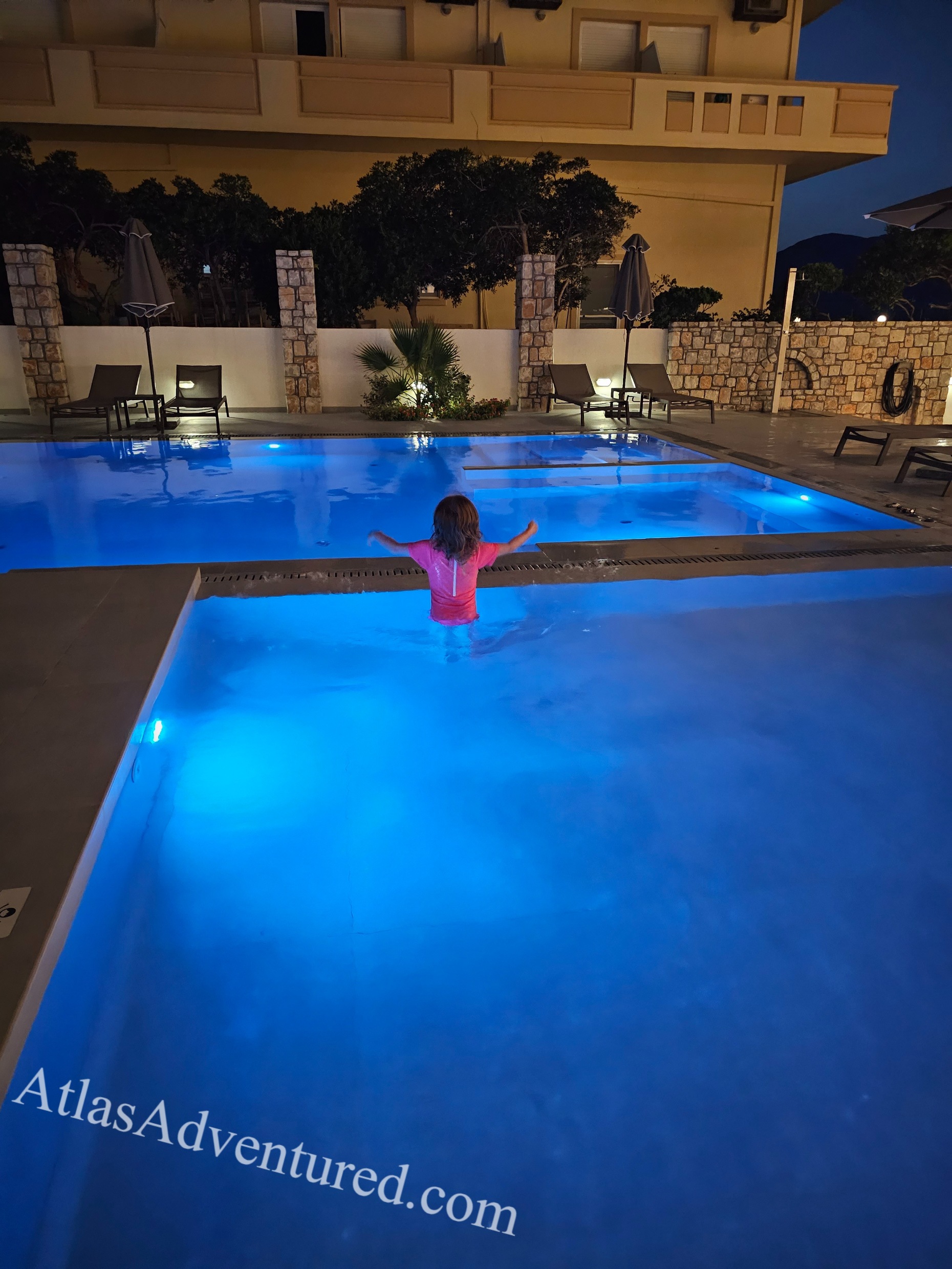 Atlas Adventured family enjoying the beautiful pool at Sunny Bay Hotel in Kissamos, Crete