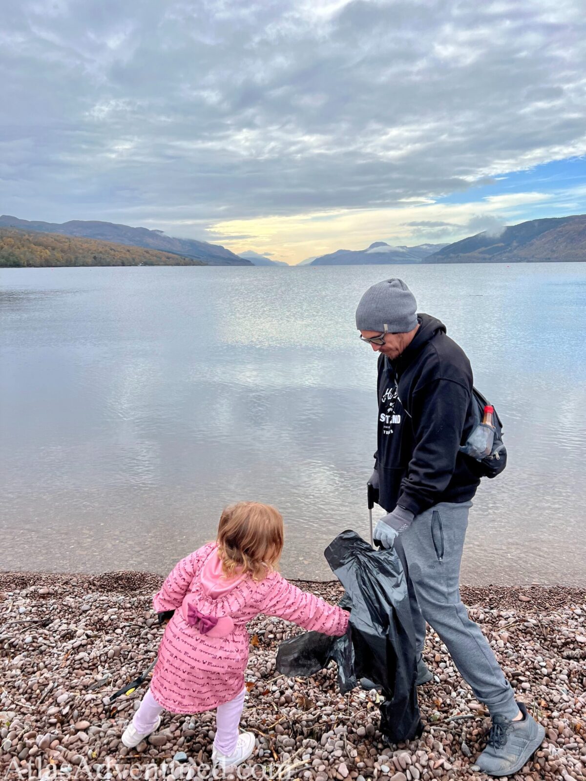 AtlasAdventured family picking up trash at Loch Ness