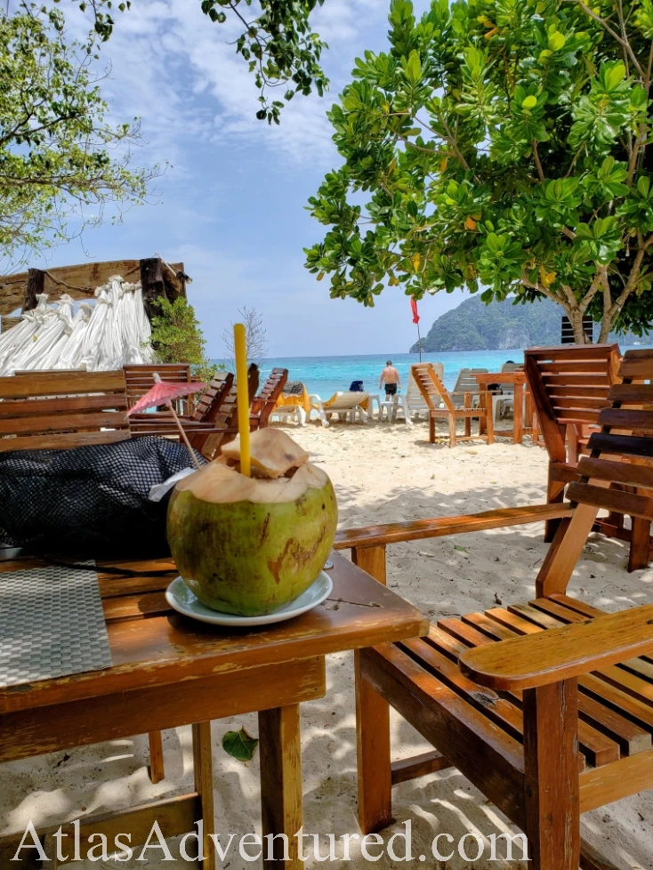 Coconuts and lunch in the sand on Phi Phi Island