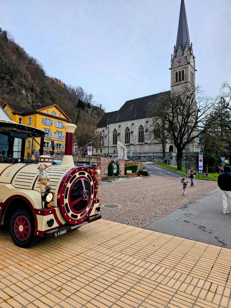 Kids train and Vaduz Cathedral in Liechtenstein at Christmas Market