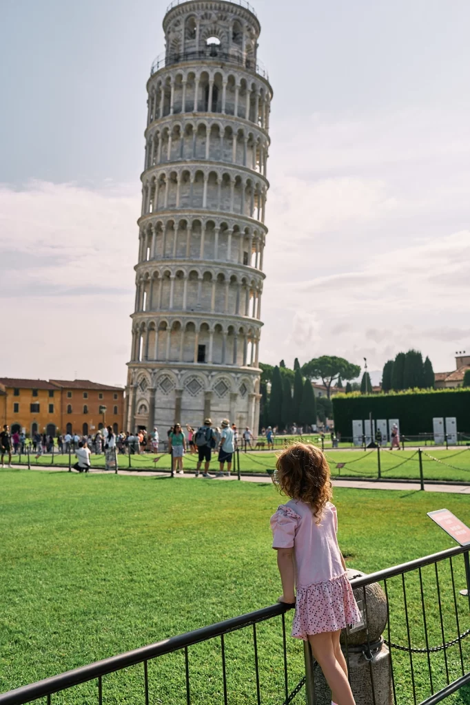Millie at leaning tower of pisa in pisa, italy