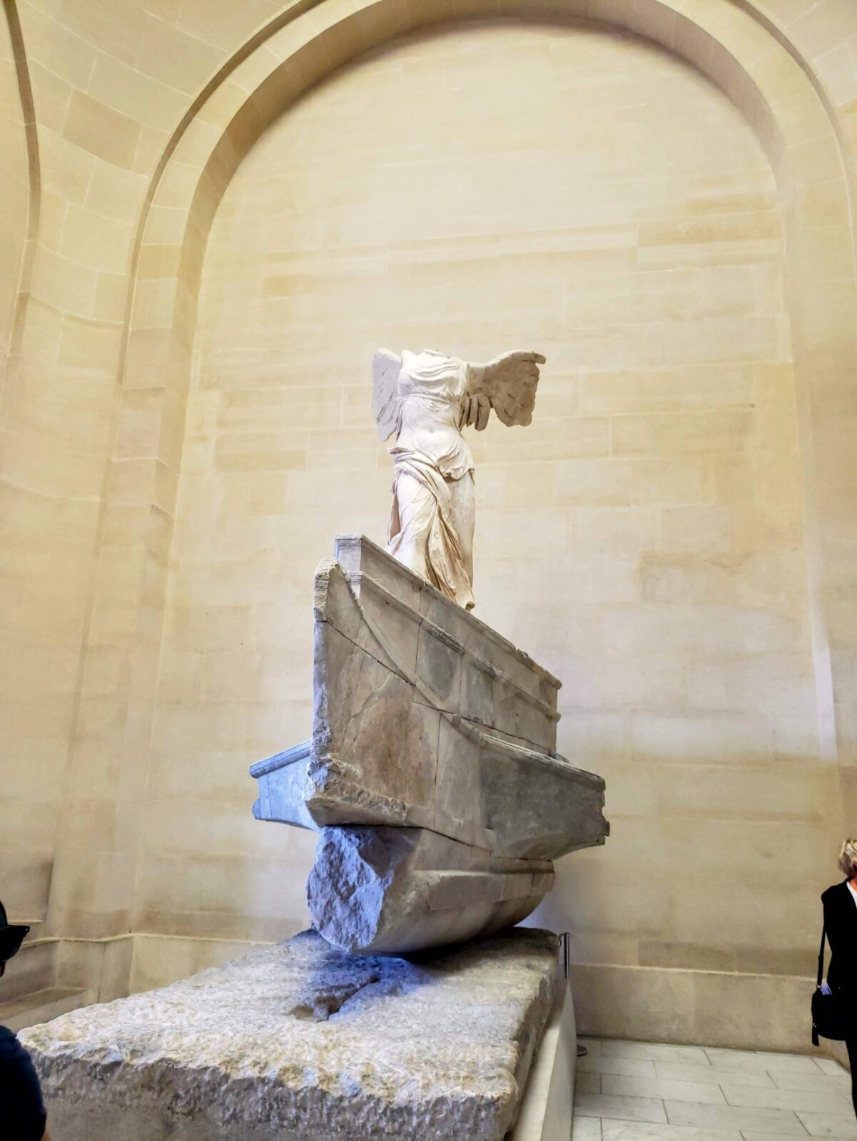 Nike - Winged Victory of Samothrace statue at the Louvre in Paris, France
