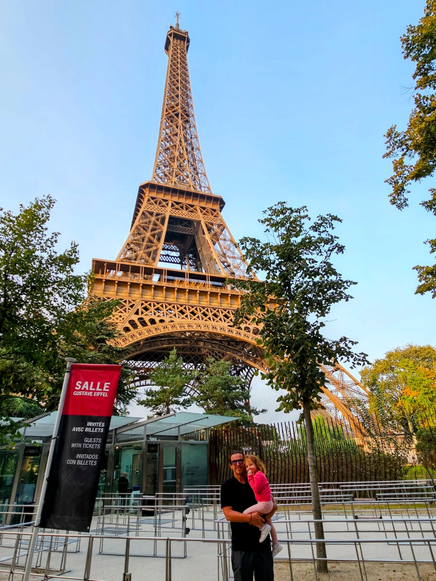 Dad and Millie in front of Eiffel Tower in Paris France during Fall