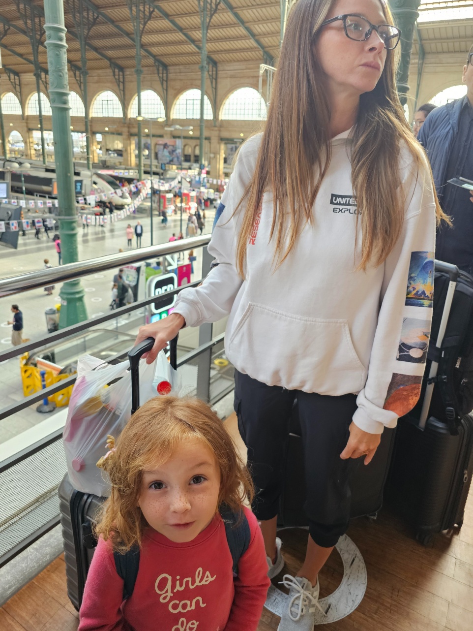 Standing in line to board the chunnel train in Paris, France