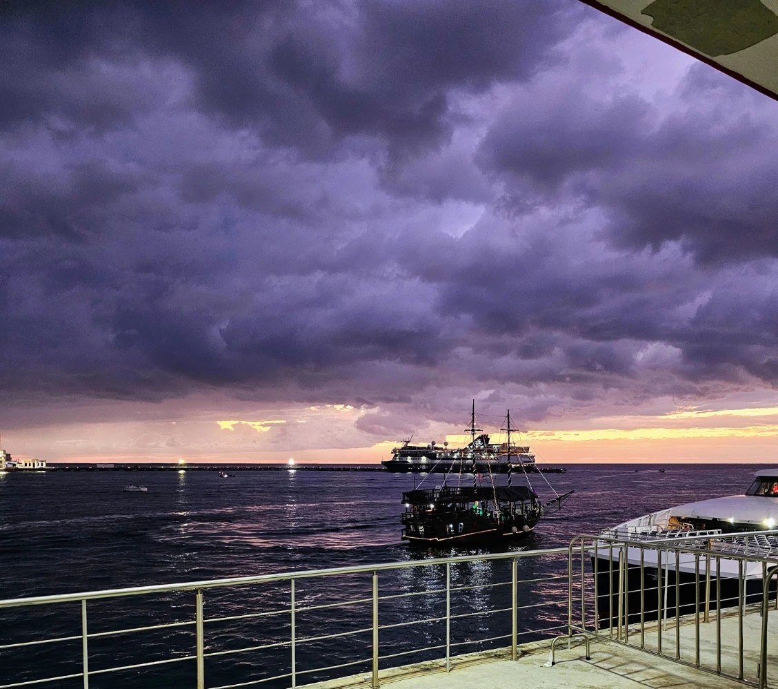 Purple clouds over the Caribbean Sea at the ferry port for Cozumel to Playa del Carmen in Mexico